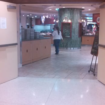Market Place Cafe - a woman walking through the entrance - Cafeteria Near Me - Stony Brook, New York Market Place Cafe - a woman walking through the entrance - Cafeteria Near Me - Stony Brook, New York