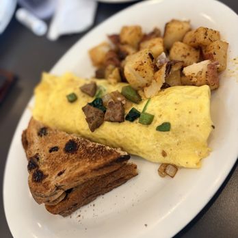 Eggs Up Grill - Pick 3 Omelet raisin toast Side Home Fries - Breakfast & Brunch Near Me - Orlando, Florida