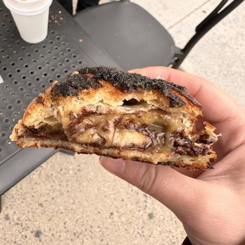 Somedays Bakery - Inside of black sesame tahini croissant. - Bakeries Near Me - Astoria, New York Somedays Bakery - Inside of black sesame tahini croissant. - Bakeries Near Me - Astoria, New York