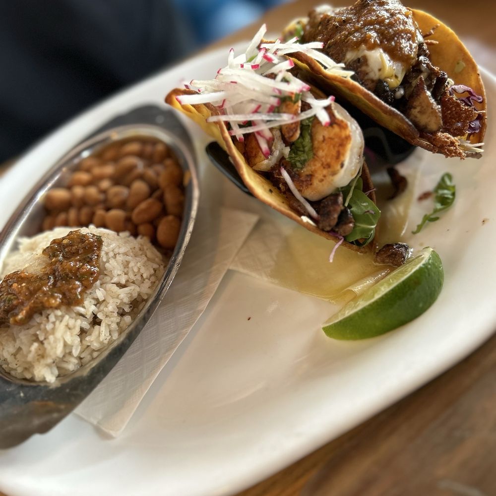 The Funky Taco - Surf and Turf and Classic chicken tacos with crispy corn shells and a side of beans and rice. - Tacos Near Me - Boise, Idaho The Funky Taco - Surf and Turf and Classic chicken tacos with crispy corn shells and a side of beans and rice. - Tacos Near Me - Boise, Idaho