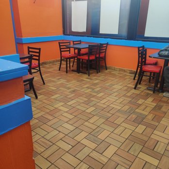 Quickie’s Burgers, Wings & Seafood - Eating area is sparse and open. - Burgers Near Me - Dania Beach, Florida Quickie’s Burgers, Wings & Seafood - Eating area is sparse and open. - Burgers Near Me - Dania Beach, Florida