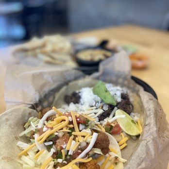 Torchy's Tacos - two tacoss on a plate - Tacos Near Me - Austin, Texas