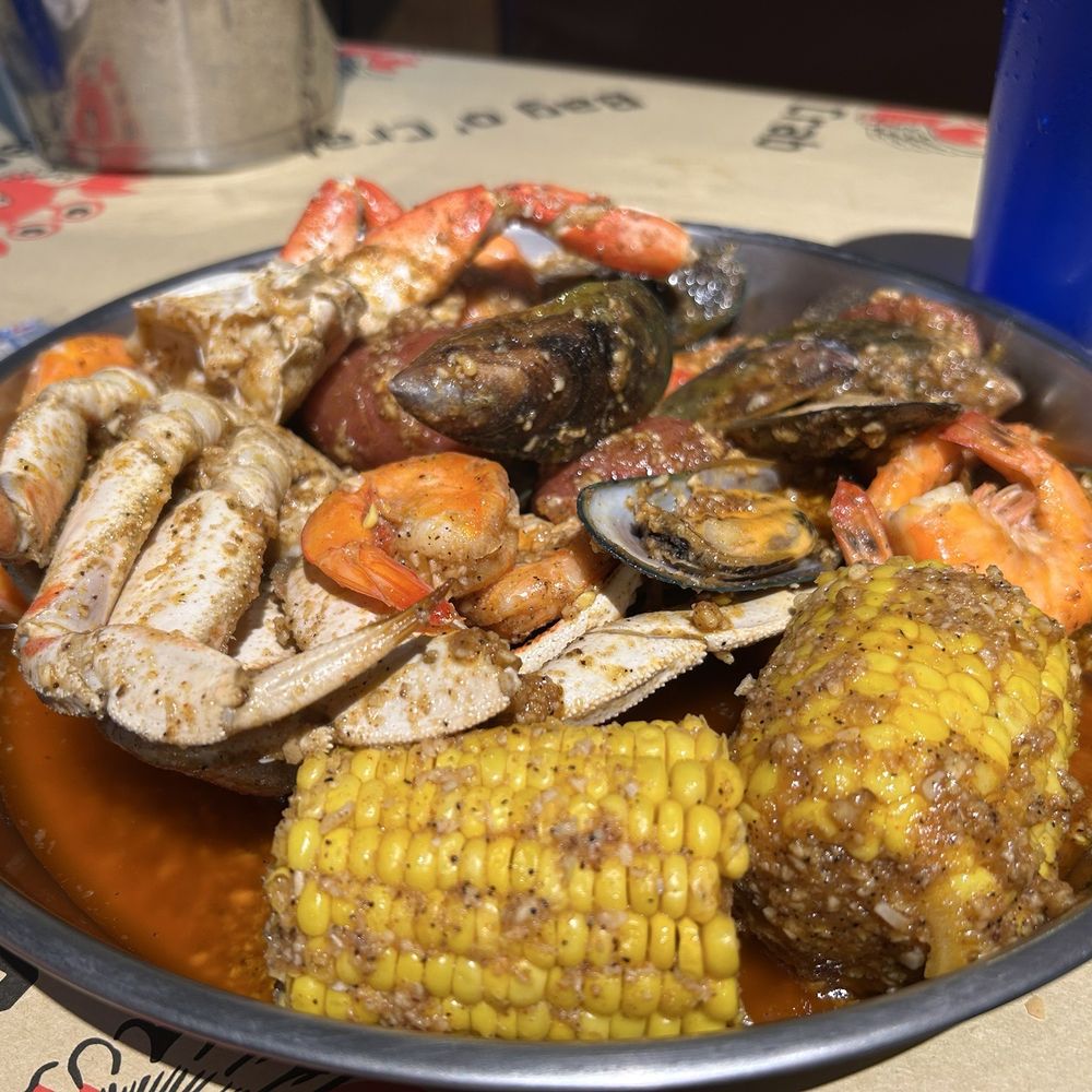 Pier 18 - Combo 2 with mussels, Dungeness crab and shrimp, spicy seasoning - Seafood Near Me - Saginaw, Texas Pier 18 - Combo 2 with mussels, Dungeness crab and shrimp, spicy seasoning - Seafood Near Me - Saginaw, Texas
