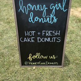 a sign for a donut shop a sign for a donut shop