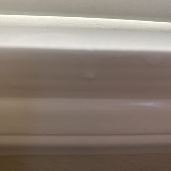 Bright Painting - Drip paint on window seal - Painters Near Me