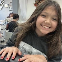 Happy with her polished and painted nails Happy with her polished and painted nails