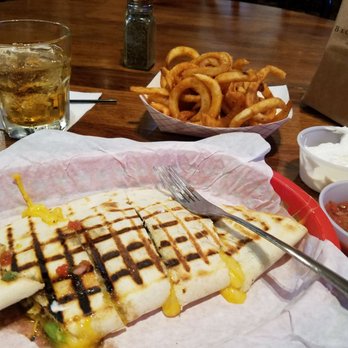 Hondo's - Crown vanilla on the rocks, curly fries and portabella mushroom quesadillas. - Bars Near Me - Fredericksburg, Texas Hondo's - Crown vanilla on the rocks, curly fries and portabella mushroom quesadillas. - Bars Near Me - Fredericksburg, Texas