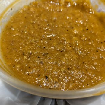 E'Njoni Cafe - The offending misir (red lentils) in all its brothy, brownish green glory. - Ethiopian Near Me - Portland, Oregon E'Njoni Cafe - The offending misir (red lentils) in all its brothy, brownish green glory. - Ethiopian Near Me - Portland, Oregon