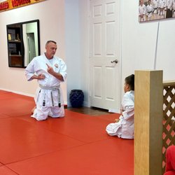 Traditional Karate and Aikido - My son was shy and didn't want to stand. Shihan didn't  pressure him to stand but took it as an opportunity to teach from the ground.