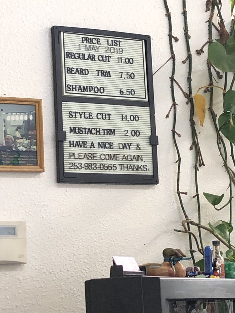 Yong's Barber Shop Logo
