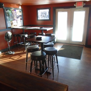 Roosters Roadhouse - The enclosed smoking lounge area - on the right when you walk in. - Bars Near Me - New Richmond, Wisconsin Roosters Roadhouse - The enclosed smoking lounge area - on the right when you walk in. - Bars Near Me - New Richmond, Wisconsin