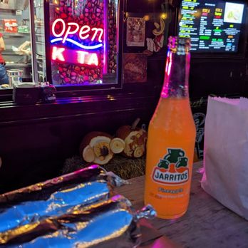 Taquitos - a hot dog and a bottle of soda - Mexican Near Me - Pittsburgh, Pennsylvania
