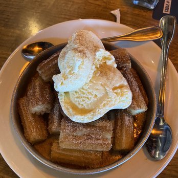 BJ's Restaurant & Brewhouse - a bowl of waffles and ice cream - New American Near Me - Hurst, Texas