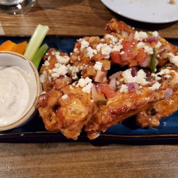 Oak 36 Bar & Kitchen - Mexi-Cali wings without green onions, side of blue cheese - Amazing flavor! Doesn't need the Pico or side sauce! - Bars Near Me - Savannah, Georgia Oak 36 Bar & Kitchen - Mexi-Cali wings without green onions, side of blue cheese - Amazing flavor! Doesn't need the Pico or side sauce! - Bars Near Me - Savannah, Georgia