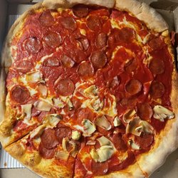 Franco's Pizza - Upside Down Pizza, Pepperoni, Half with Artichoke hearts.