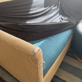 Sonesta ES Suites - Crumbs all over the couch when I try to clean it, I saw that the couch was totally damaged! So gross! - Hotels Near Me - Flagstaff, Arizona