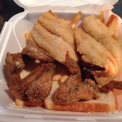 Mr. Wings Fish & Chicken - 4 wings, 2 catfish, fries and a bread.