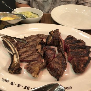 Goodman - Bone in ribeye on left and T-bone steak - both medium rare - Steakhouses Near Me - London, XGL