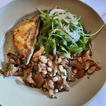 Chez Panisse - Chanterelles mushrooms with shell beans, fried polenta cake, and arugula and fennel salad - New American Near Me - Berkeley, California Chez Panisse - Chanterelles mushrooms with shell beans, fried polenta cake, and arugula and fennel salad - New American Near Me - Berkeley, California