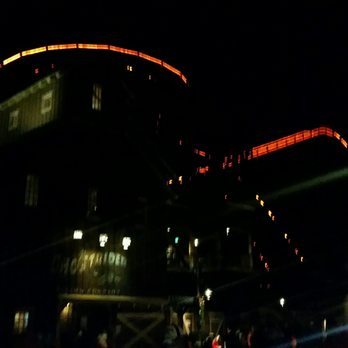 GhostRider - In this (low-res) photo you can clearly see GhostRider's turnaround at top left and drop on the right. Note the orange rope lights! - Amusement Parks Near Me - Buena Park, California GhostRider - In this (low-res) photo you can clearly see GhostRider's turnaround at top left and drop on the right. Note the orange rope lights! - Amusement Parks Near Me - Buena Park, California