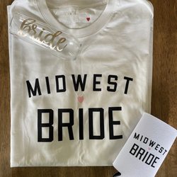 Marah's Elegant Bridal - Midwest Bride goodies: Champaign flute, can coozie, Midwest Bride shirt.