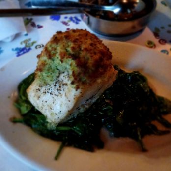 Ruth's Chris Steak House - Sea bass on a bed of spinach - Steakhouses Near Me - Weehawken, New Jersey Ruth's Chris Steak House - Sea bass on a bed of spinach - Steakhouses Near Me - Weehawken, New Jersey