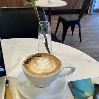 Criterion coffee - Pistachio latte with edible rose garnish - Coffee & Tea Near Me - Pasadena, California Criterion coffee - Pistachio latte with edible rose garnish - Coffee & Tea Near Me - Pasadena, California