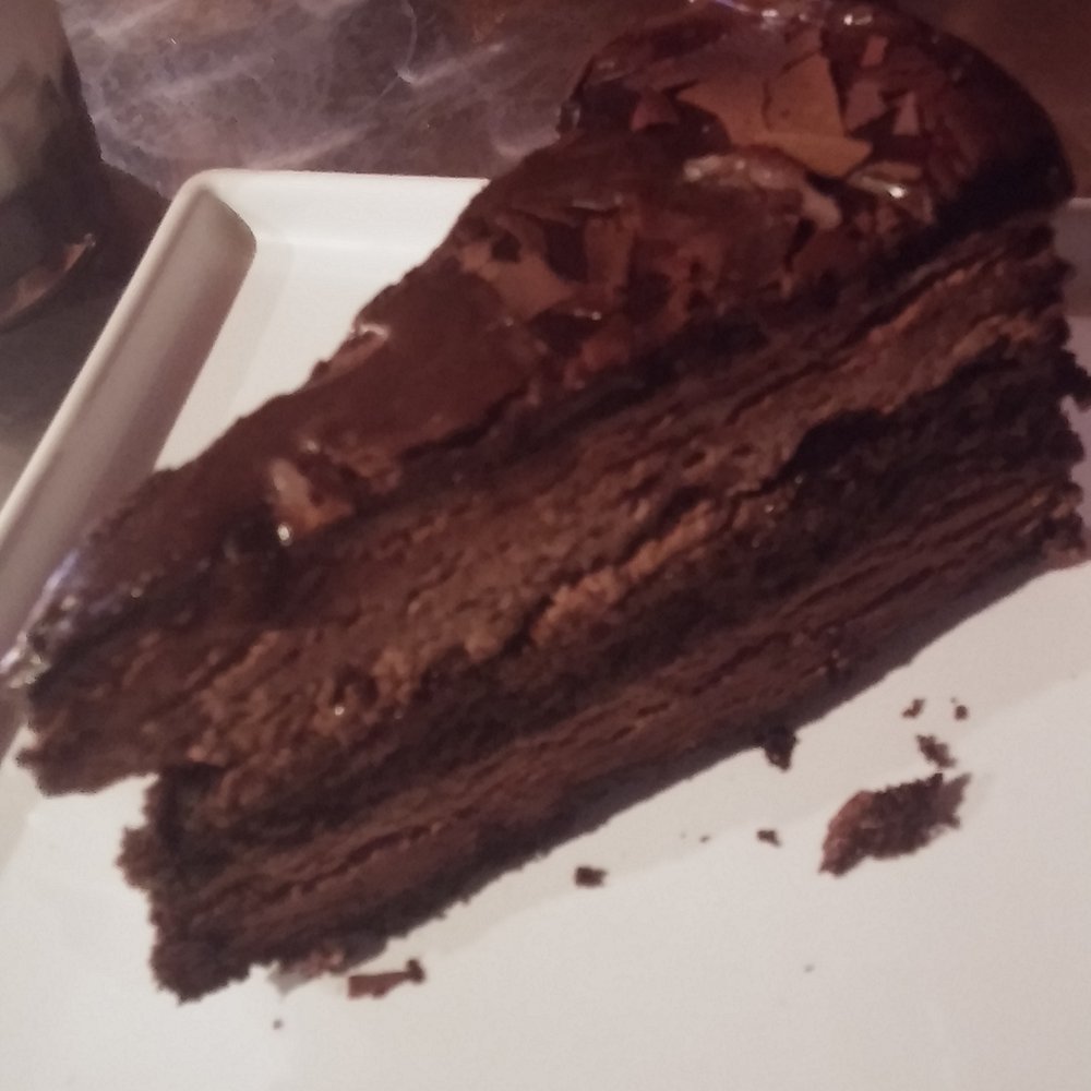 Tea Leaf Cafe - Chocolate Overload Torte - Coffee & Tea Near Me - Amherst, New York Tea Leaf Cafe - Chocolate Overload Torte - Coffee & Tea Near Me - Amherst, New York