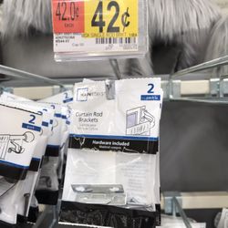 Walmart Supercenter - This is the curtain rod bracket that Lowe's does not carry. 42 cents.