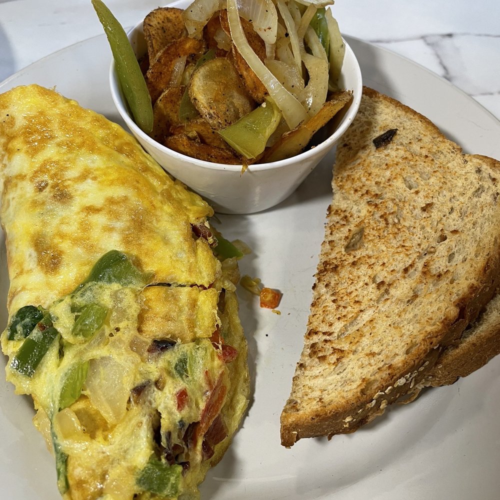 Poach Social - Poach Social Omelette Potato Medallions - Breakfast & Brunch Near Me - Atlanta, Georgia Poach Social - Poach Social Omelette Potato Medallions - Breakfast & Brunch Near Me - Atlanta, Georgia