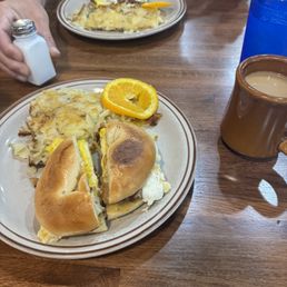 bacon egg bagel and home fries bacon egg bagel and home fries