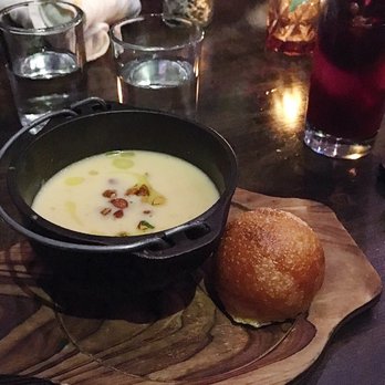 Fireside - First course: Truffled potato soup with almonds & parker roll - New American Near Me - Portland, Oregon