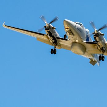 Coronado Center Beach - Inbound HLS surveillance aircraft over the beach - Beaches Near Me - Coronado, California
