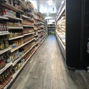 Colusa Market - Milk/ cheese/cold cut fridge, shelves filled with great variety of canned items and jars. A welcome upgrade. - Grocery Near Me - Kensington, California Colusa Market - Milk/ cheese/cold cut fridge, shelves filled with great variety of canned items and jars. A welcome upgrade. - Grocery Near Me - Kensington, California