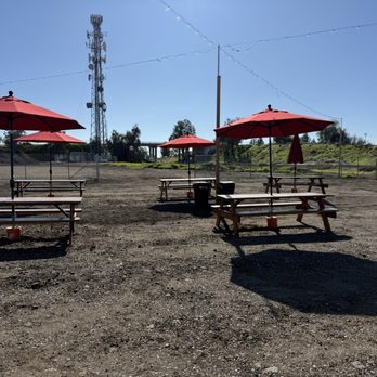 Pop Pop's Pizza - Seating with patio umbrellas - Pizza Near Me - McFarland, California Pop Pop's Pizza - Seating with patio umbrellas - Pizza Near Me - McFarland, California