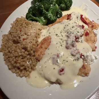 J. Alexander's - Palermo Chicken | pan fried w/ goat cheese, sundried tomatoes, beurre blanc, couscous, & broccoli - New American Near Me - Jacksonville, Florida J. Alexander's - Palermo Chicken | pan fried w/ goat cheese, sundried tomatoes, beurre blanc, couscous, & broccoli - New American Near Me - Jacksonville, Florida