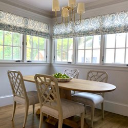 Tyler & Sash - New lighting, fresh chairs, a custom table and the most stunning fabric roman shades make for the perfect breakfast nook.