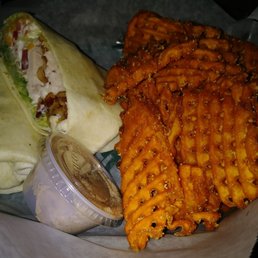 Turkey club wrap with sweet potato fries Turkey club wrap with sweet potato fries