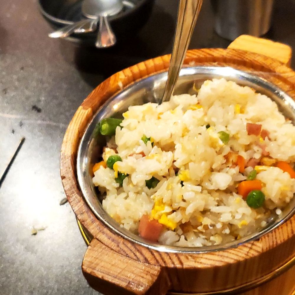 a bowl of rice and vegetables a bowl of rice and vegetables