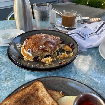 The Tavern - a plate of pancakes and a cup of coffee - American Near Me - Essex Junction, Vermont