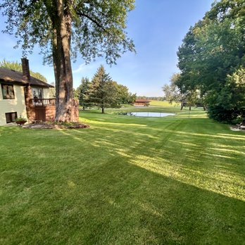 BlueGrass Lawns - Lawn Care & Pest Control that creates this healthy, green, and thriving lawn in Belding, MI! - Lawn Services Near Me - Belding, Michigan BlueGrass Lawns - Lawn Care & Pest Control that creates this healthy, green, and thriving lawn in Belding, MI! - Lawn Services Near Me - Belding, Michigan