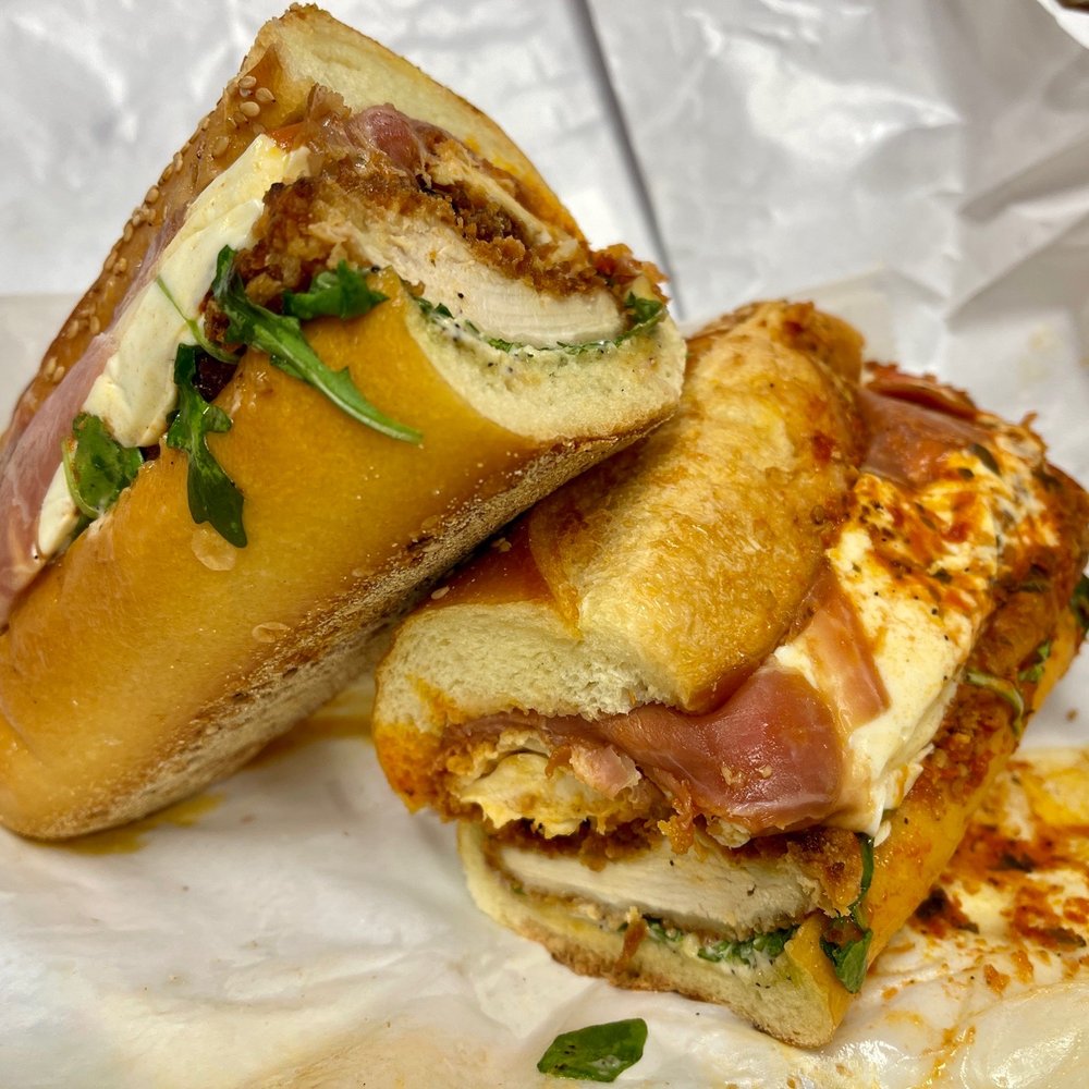 mercato cucina - Monthly Special - The Sorrentino - chicken cutlet, fried eggplant, prosciutto, mozzarella, arugula, garlic aioli, tomato sauce on Semolina - Coffee & Tea Near Me - Huntington Station, New York