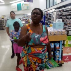 Walgreens - Woman with breasts falling out calling me racist names