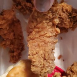 KFC - Actual KFC chicken strips!! That is the entire strip all 2 inches of it!