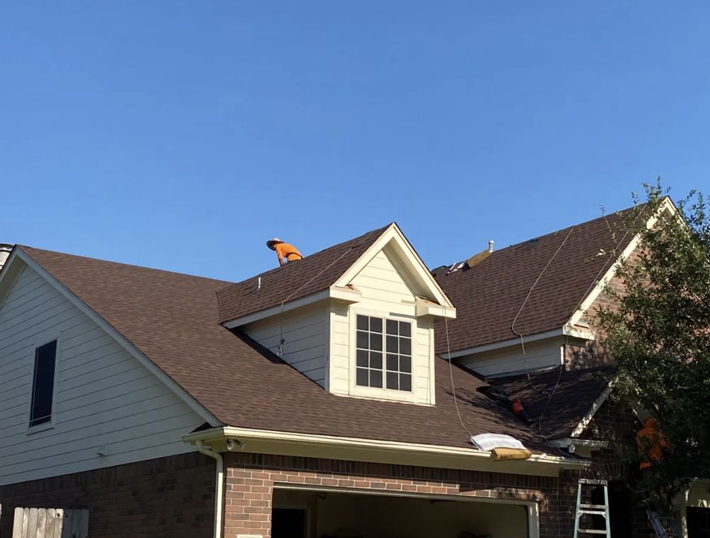 Slide of Redfish Roofing Company