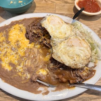 Guillermo's Double L Restaurant - Sonoran Enchiladas with shredded beef and 2 over easy eggs on top - Mexican Near Me - Tucson, Arizona Guillermo's Double L Restaurant - Sonoran Enchiladas with shredded beef and 2 over easy eggs on top - Mexican Near Me - Tucson, Arizona