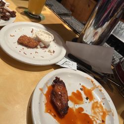 Holy Smoke - Coconut shrimp and buffalo smoked wings