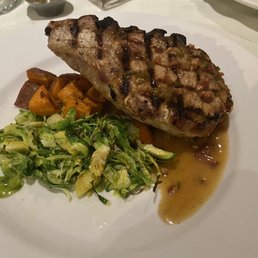 Pork chop with Brussel sprouts and savory sweet potatoes Pork chop with Brussel sprouts and savory sweet potatoes