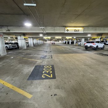 Dollar Car Rental - A parking lot with no available rental cars. - Car Rental Near Me - Orlando, Florida Dollar Car Rental - A parking lot with no available rental cars. - Car Rental Near Me - Orlando, Florida