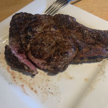 Bison Steakhouse - Cowboy ribeye medium rare - Steakhouses Near Me - Broken Arrow, Oklahoma